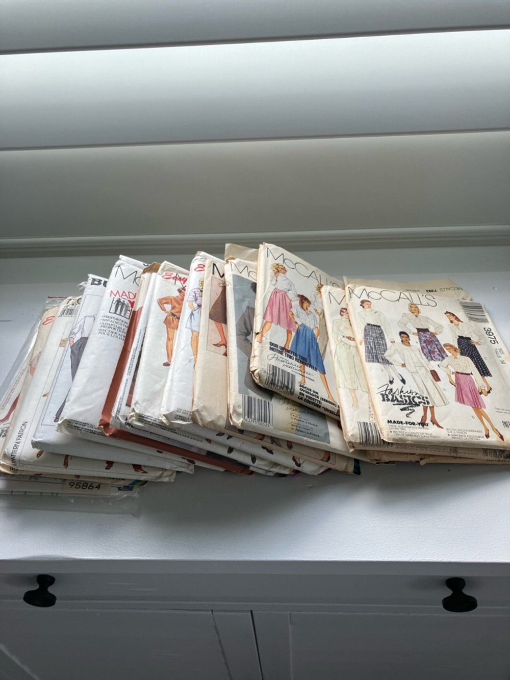 16 vintage sewing patterns, women’s pants skirts, and jackets size is 10–16